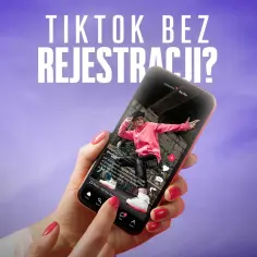 Dłoń trzyma smartfon z otwartym TikTokiem, na którym widać tancerza. Czy można oglądać **tiktok bez rejestracji**?