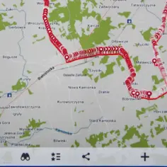 Mapa z zaznaczoną trasą przejazdu, widoczne nazwy miejscowości i zielone tereny.
